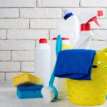 Cleaning background. Basket with cleaning products. Cleaning with supplies, service and clean house